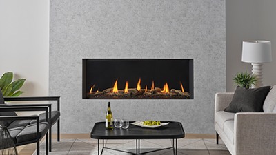 Large premium gas fireplace with dual-glass safety barrier, premium burner and hand-crafted logs.